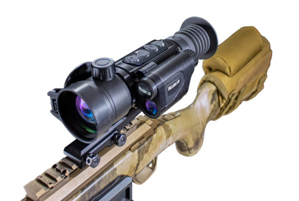 Predator Thermal Optics Mission LRF line of Thermal Imaging Scopes is a world-class thermal imaging riflescope that incorporates a compact, sleek, lightweight, aluminum design with a 1200-yard built-in laser rangefinder. Its exceptionally powerful 384×288 SUPERSENSITIVE resolution is capable of heat detection distances up to 2,750 yards and displays them on a sharp 1024×768 OLED display while offering the latest IMAGE BOOST patented technology. With up to 8 hours of battery life on a set of 18650 batteries, the Mission LRF Thermal Riflescope ensures hours of continuous use with the ability to quickly swap batteries at a cost-effective price. A highly precise, ambidextrous top-located focus ring allows for quick, precise focus adjustment ensuring the highest picture quality display. Picture/picture mode, ballistics calculator, and the 1200-yard laser range finder all complement with added confidence on long-distance shots. Technologically advanced, the Predator Thermal Optics Mission LRF features built-in photo and video recording with sound as well as Wi-Fi connectivity to upload data to the Predator Thermal Optics APP. Additionally, the Predator Thermal Optics Mission LRF can withstand greater than 12-gauge calibers and offers an industry-leading 10,000 Joules of recoil resistance protection. The Mission LRF boasts an IP66 waterproof rating for use in the most severe of weather conditions. When you need a powerful thermal riflescope with a classic design and built-in laser rangefinder, few scopes can match the exceptionalism of the Mission LRF. Featuring 8 reticle shapes in 5 color modes, Picture-in-picture mode, built-in LASER for game recovery, and 10 unique shooting profiles.